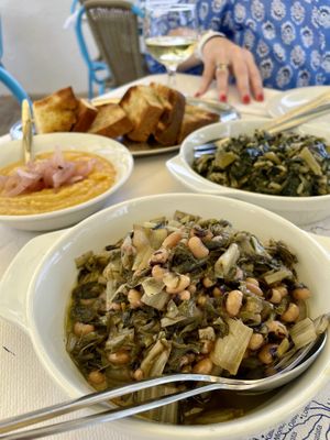 Fava grilled bread with oil and oregano, black eyed beans and spinach and rice    at Paradise Beach  in Kefalonia