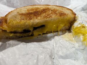 1/2 a grilled cheese with bacon at Maciel's Plant-Based Butcher & Deli in Los Angeles