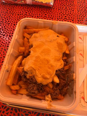 Queso Brisket fries  at Maciel's Plant-Based Butcher & Deli in Los Angeles