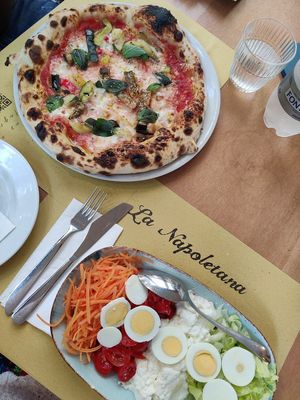 Vegetarian pizza and vegetarian salad at La Napoletana in Taormina