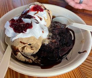 Brownie sundae - best I’ve EVER eaten, vegan or not. Hard to tell size- it’s GIANT with two huge scoops of salted caramel gelato 🤤  at Dees Brothers Brewery in Sanford