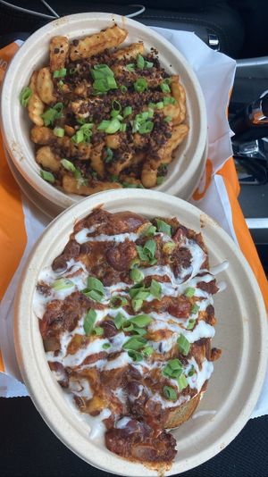 Chili cheese dog with fries   at Next Level Burger - West Burnside in Portland