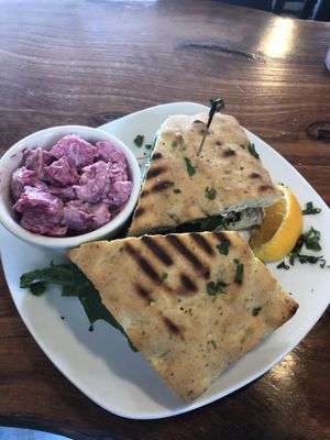 muffuletta with Potato’s. So good! at End of the Line Cafe in Pensacola