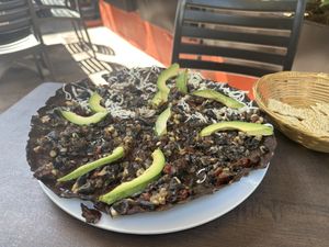 Mushroom Tlayuda (crispy mex tortilla pizza)  at Tikua in Queretaro
