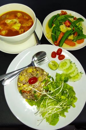 Massaman Curry with Stir-fried veggies and fried rice. at Chada Vegetarian Restaurant in Chiang Mai
