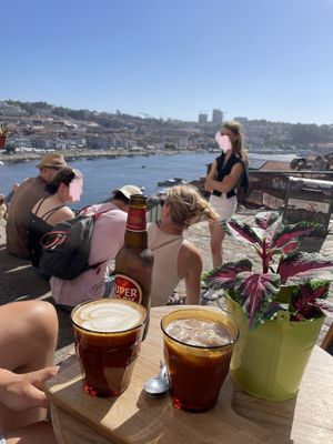 Great view on river (soy iced coffee, normal soy coffee)   at My Coffee Porto in Porto