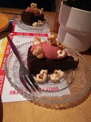 Brownie with strawberry topping and caramel popcorn  at Boca Boca Vegan Guilty Pleasure in Warsaw