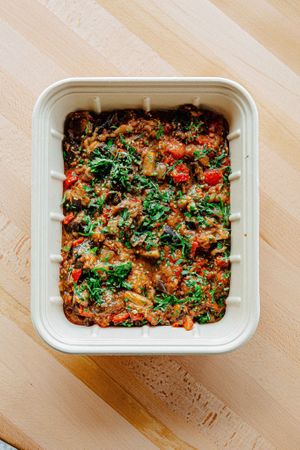 Our eggplant caponata is a warm dish that has the best veggies of the season.  at ANA Bar and Eatery in New York City