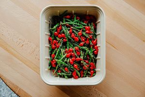 Green beans with cherry tomatoes.   at ANA Bar and Eatery in New York City