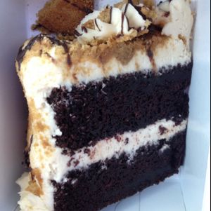 Caramel Soaked Chocolate Cake with Caramel Buttercream Frosting + Madagascar Wafer Cookies & Chocolate Ganache drizzle  at nami Vegan Sweets in Phoenix