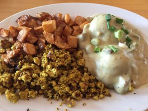 Garden Herb Biscuits with Sausage Gravy, Scrambled Tofu, and Hash Potatoes at nami Vegan Sweets in Phoenix