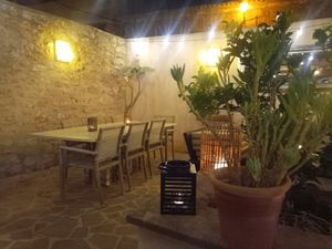 Courtyard seating area at Restaurante Anoa Santanyí in Mallorca