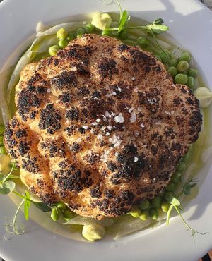 Roasted cauliflower labeled vegan   at Alma Tierra Restaurante in Tijuana