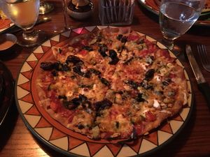 ";The Works"; pizza -- roasted veggies, feta, and Greek olives -- so good! at Calactus Cafe in Moncton