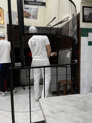 Pizza making in action  at Pizzeria da Michele in Naples