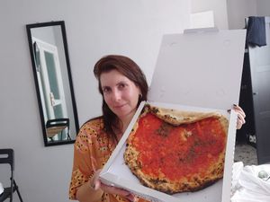 Eating pizza at our Airbnb 5 minutes by foot from the pizzeria 😂😂😂 at Pizzeria da Michele in Naples