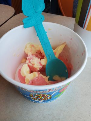 I should have taken a picture before I gave it to my child but the strawberry and pineapple sorbet is so good. at Menchie's Frozen Yogurt in Tyler