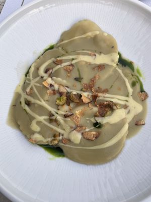 Vegan pumpkin ravioli with asparagus cauliflower purée  at Roof Garden in Athens