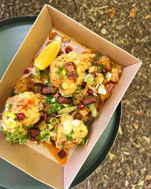 Cumin Roasted Cauliflower - on a cauliflower cream pure, cauliflower leaves, house made 'chorizo', harissa & lemon butter, roasted flaked almonds, pomegranate & paprika new pots at The French Fox in Isle Of Arran