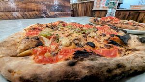 Build your own with vegan mozz, roasted garlic, jalapeno, caramelized onion at Brick Pizzeria Napoletana in North Dartmouth