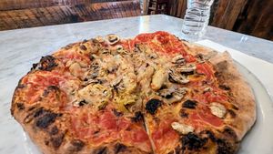 Build your own with sourdough, vegan mozz, mushroom, roasted garlic, and artichoke at Brick Pizzeria Napoletana in North Dartmouth