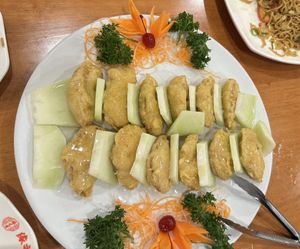 Champagne chicken (fun to try but very sweet, with melon) - beautiful presentation!  at Lucky Vege House Inc in Brooklyn