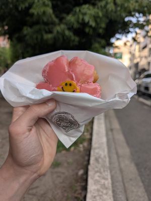 flower shaped donut eaten outside at Trick or Treat Vegan Sweets (formerly Canelita Sweets) in Osaka