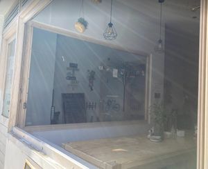 Outside (when the weather is good they open their windows, it's quite nice to seat there) at Sweet Studio in Madrid