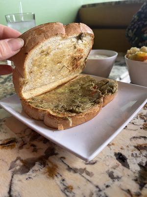 Toast with *some* avocado   at The Soulful Vegan in Akron
