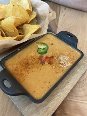 Finaly got cheese dip, a little runny but love the flavor  at Bentonville Taco & Tamale Co in Bentonville