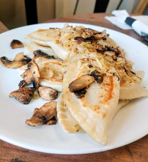 12 for $18 with sauerkraut, onions, and mushrooms on top at Inna's Pierogi Shop in Lititz