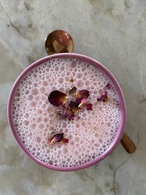 Pink unicorn: beet, rose water, ashwaganda, honey, oat mylk.   at Herbalista Love in Cabarete