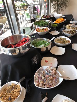 It’s 30 minutes before closing time and the buffet is still being stocked at Frida's in University City