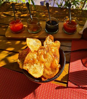 Chips with 3 vegan sauces, one of the four sauces was not vegan at Eat Me Kech in Marrakech