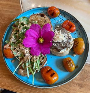 This tofu scramble was amazing.  Topped with mushrooms and served with gf sourdough.  So so good    at Benny & Bloom in Kuta