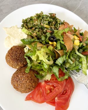 Delivered lunch: falafels, Fattoush, tabbouleh, hummus at Falafel Al Darwandy in Yerevan