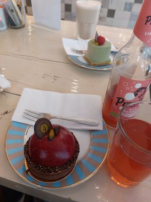 Cherry Lady Pastry and something with raspberry pistaccio in the back at Isabella Glutenfeie Pâtisserie in Frankfurt