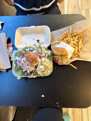 Yum! So much blue cheese on my salad that it was falling off when brought to me!!!  at Juicy J's Smoked Burgers in Poulsbo