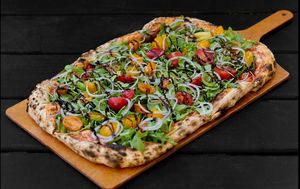 Cara Pizza in the Large size. Tomato pie topped with arugula, cherry tomatoes, onions, and a balsamic glaze drizzle.  at Macoletta Brick Oven Pizzeria in Queens