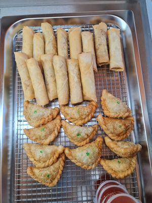 Papaya Spring rolls and curry puffs at Cookatoo Kitchen in Richmond