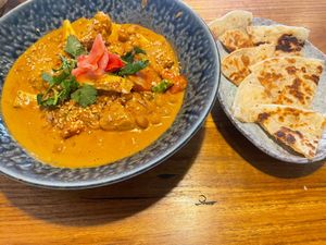 Chickpea tofu Massamum curry with side roti . Delish! at Cookatoo Kitchen in Richmond