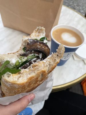 Vegan sandwich: chickpeas, dried paprika, vegan cheese, mushrooms, vegan mayo and salad leaves + cappuccino with oat milk  at Father Carpenter in Berlin