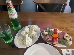 Estragon Lemonade (4 GEL), mushroom khinkali (2 GEL each) and pkhali assortment (20 GEL)  at Chashnagiri in Tbilisi