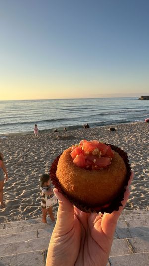 Topped with tomatoes   at Sfrigola in Cefalu
