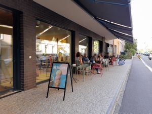 Outdoor seating at enila plant based ice cream in Basel