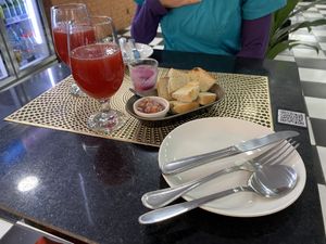 Juices, toasts and pebre are included in the lunch menu  at The Good Vibes in Santiago