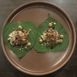 Perilla Leaf (smoked cabbage, pickled mushrooms, beet reduction, chili cream, pistachio)  at Hawker in Toronto