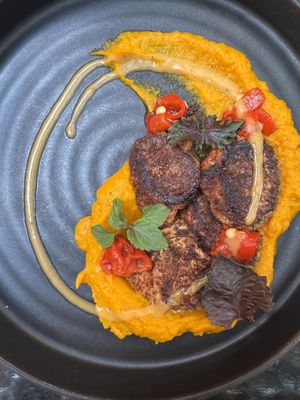 Mushroom, carrot puree, smoked peppers   at Hawker in Toronto