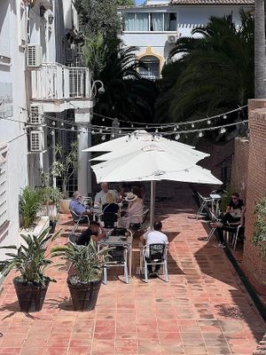 This is our lovely outdoor area. It's shady and away from street noise. Mostly you can hear birds. at Hideout Bar & Cafe in Marbella