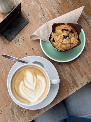 Café latte with oat milk and vegan blueberry muffin   at Shoukâ in Chamonix-mont-blanc